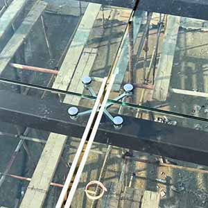 Glass Canopy Project for Underground Parking Entrance in Santiago, Chile | Application of Stainless Steel Spider Fittings and Routels