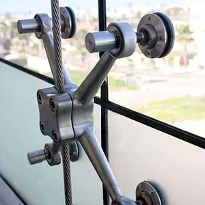 Point-Fixed Glass Curtain Walls in Mexico City: The Ultimate Guide to Spider Fittings & Seismic Safety