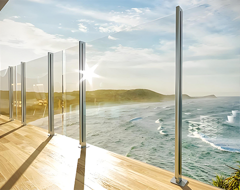 Installing stainless steel railings on the balcony of a seaside property